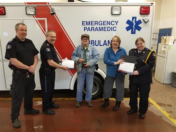 Paramedic Scott Peden; district manager Mike Sorenson; award recipients Barrie and Diana Stephen; unit chief Cheryl Spencer
