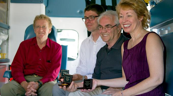 Photo of Vital Link recipients in the back of an ambulance