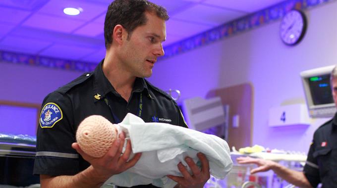 Infant Transport paramedic transporting a baby
