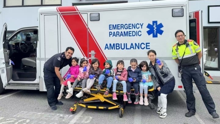 ​From Left to Right: Primary Care Paramedic Kayras Irani, students of Little Koala Montessori Academy, & Primary Care Paramedic 