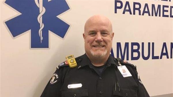 Paramedic Brad Fraser wears a carbon monoxide detector on his uniform