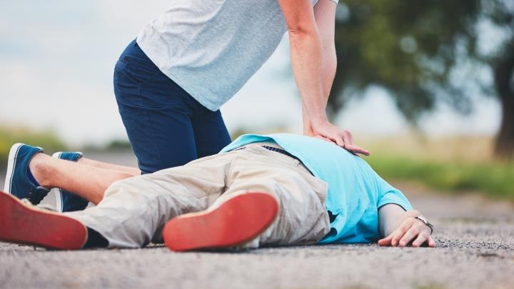Person giving CPR