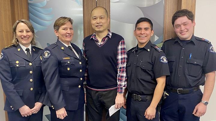 David Kwong with paramedics