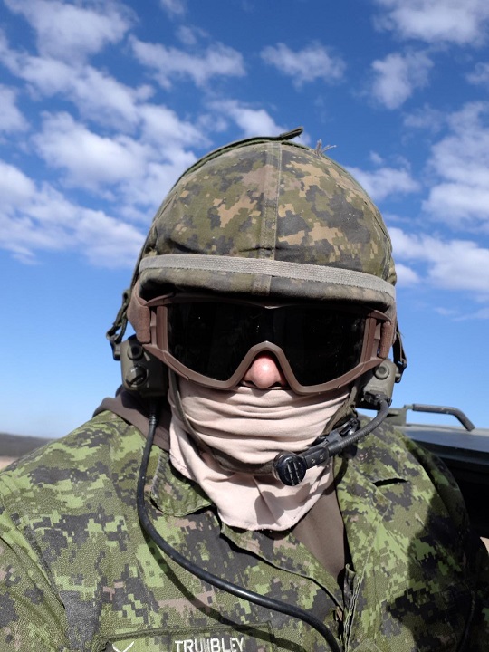 Solider in camouflage and helmet