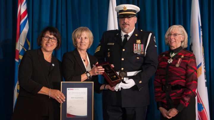 Linda Lupini, COO Barb Fitzsimmons and Lt. Governor Judith Guichon present the COO's Commendation Award to Ron Glanville.