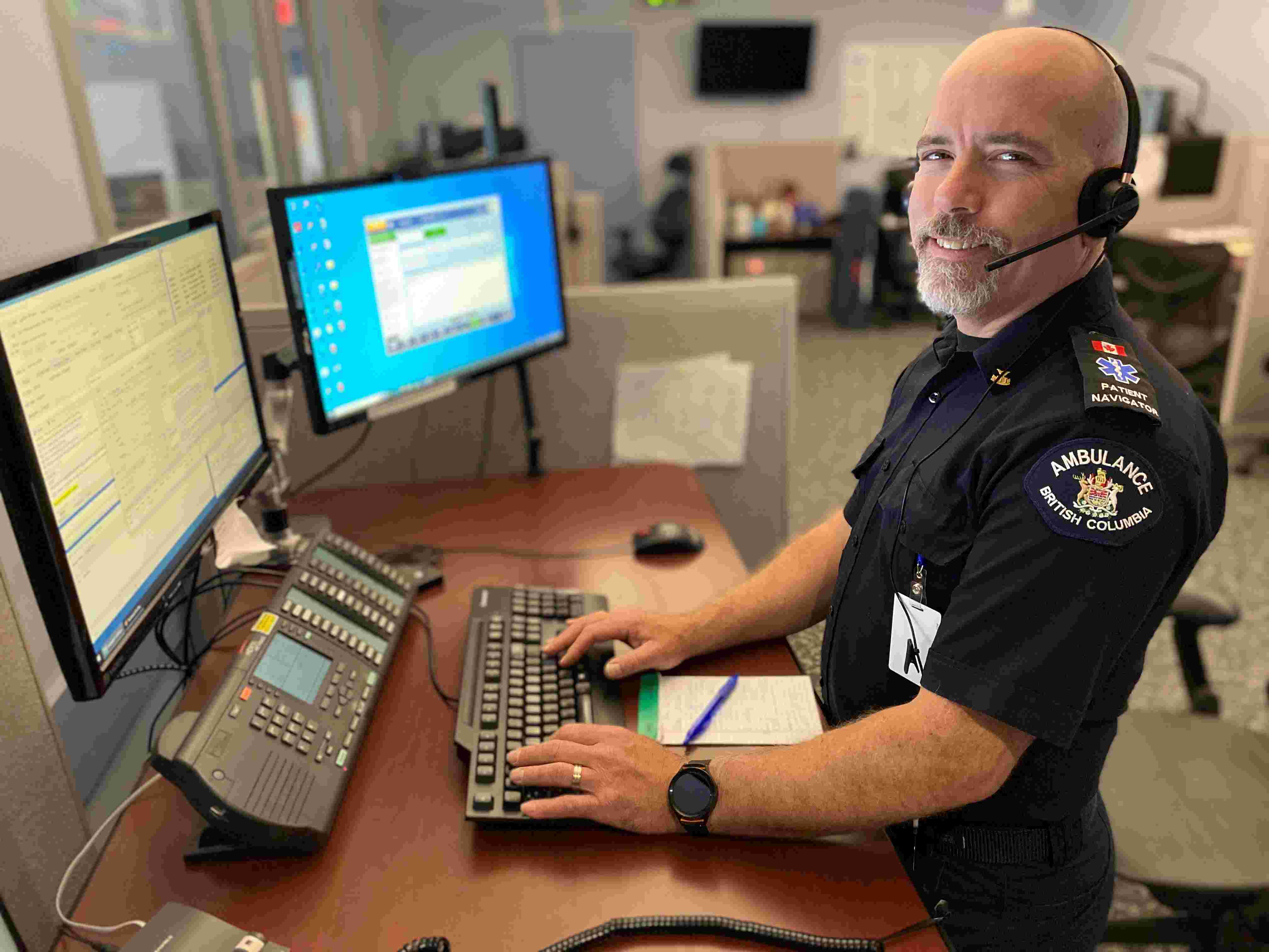 Photo of Brian Thornburn smiling in uniform