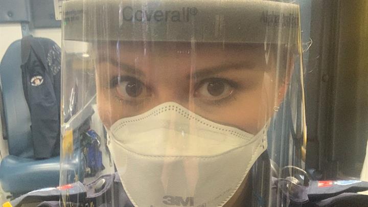Paramedic Megan Lawrence in personal protective equipment (PPE)