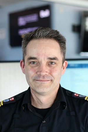 Portrait of a smiling man in uniform