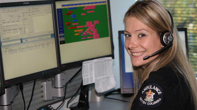 BCEHS call-taker in front of computer screens