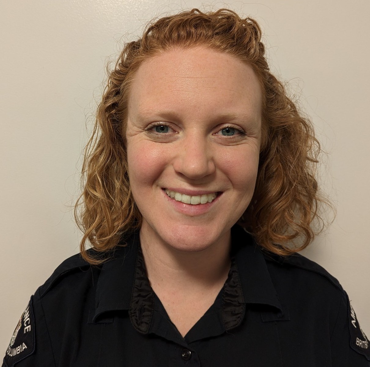 Photo of Emily Smith smiling in uniform